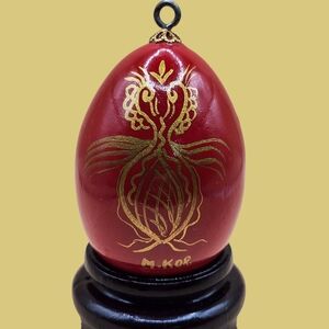 Elegant Red and Gold Decorative Egg